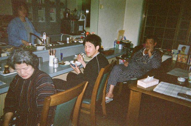 Masko, Shingo, and Hede. Sumiko in the kitchen.